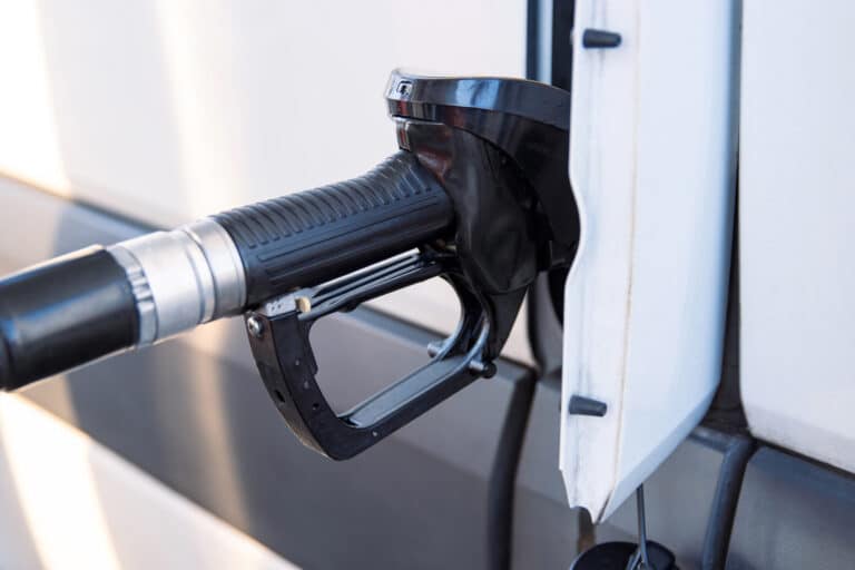 Australia halves fuel excise for three months, removes road user charge