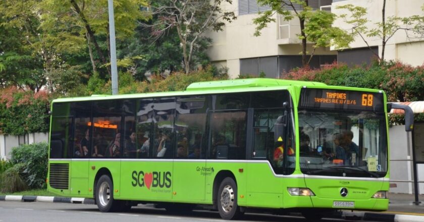 A Go-Ahead Singapore green SG Bus operating route 68 to Tampines, with passengers onboard.